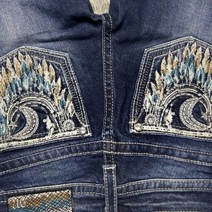 Size 27 flared Miss Me’s.